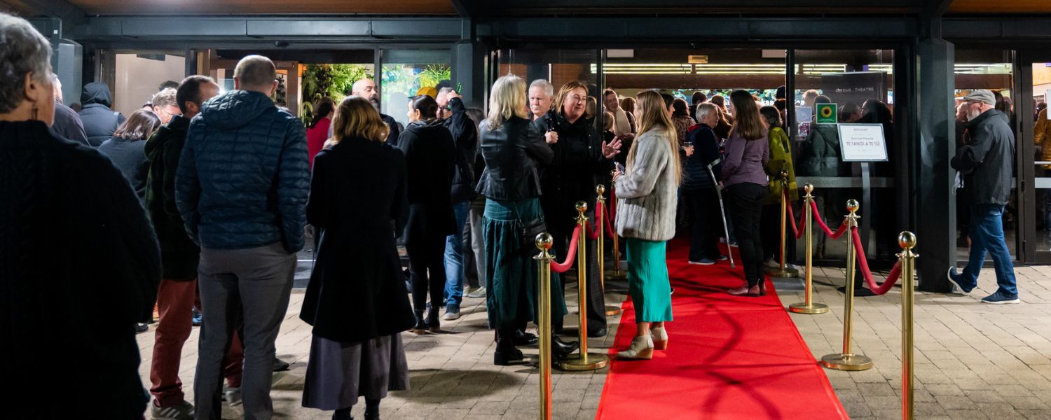 Patrons queuing to enter Baycourt before a performance.
